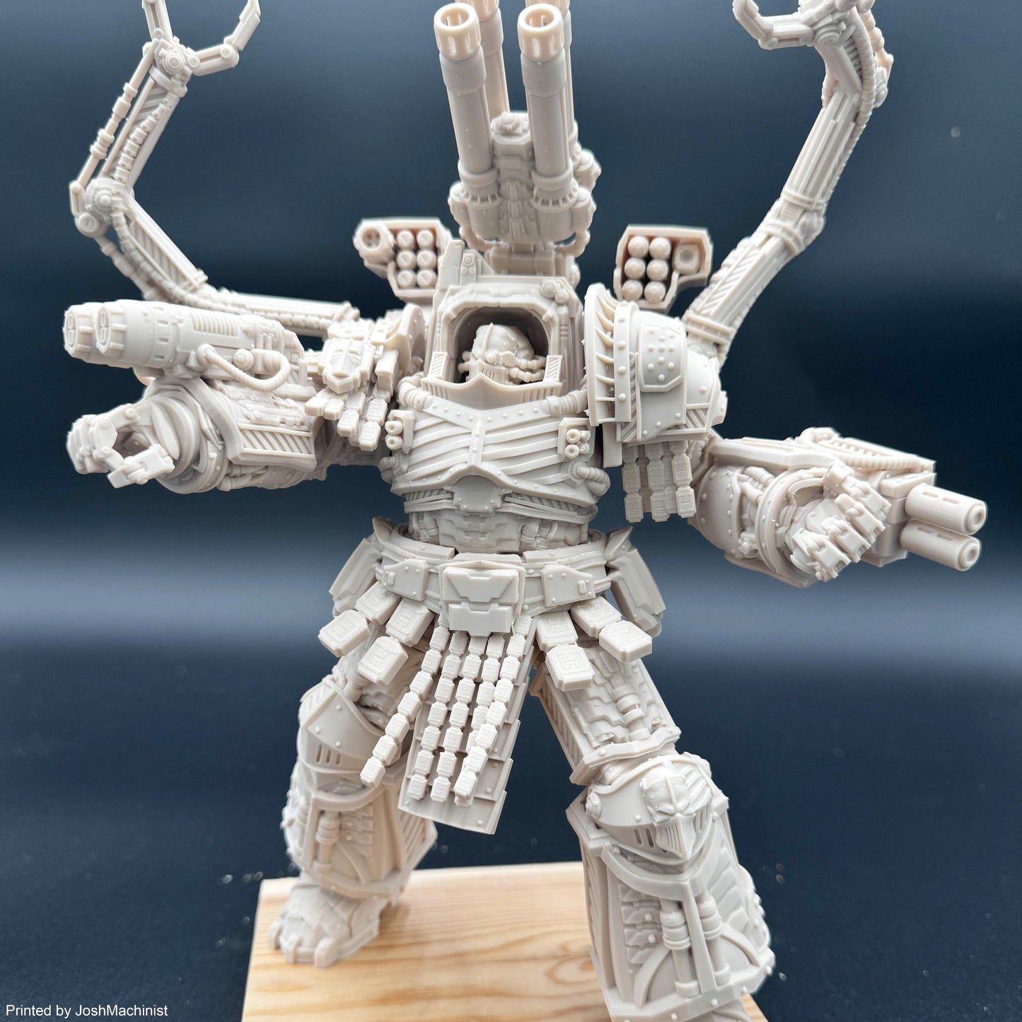 Primarch Perturabo of the Iron Warriors in full battle armour shooting his weapons