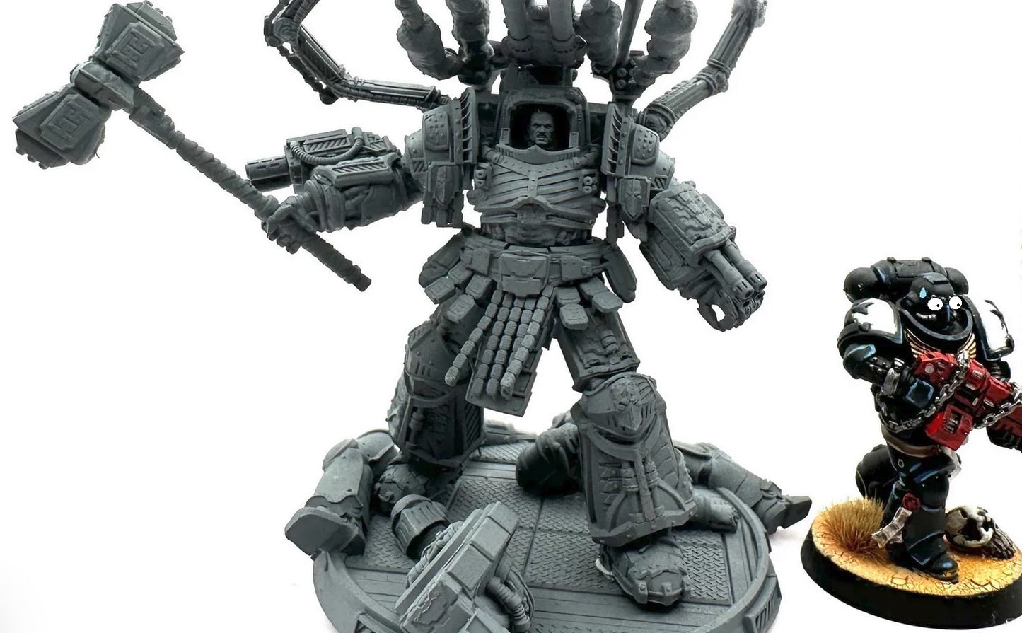 Primarch Perturabo of the Iron Warriors in full battle armour scale compared to primaris marine