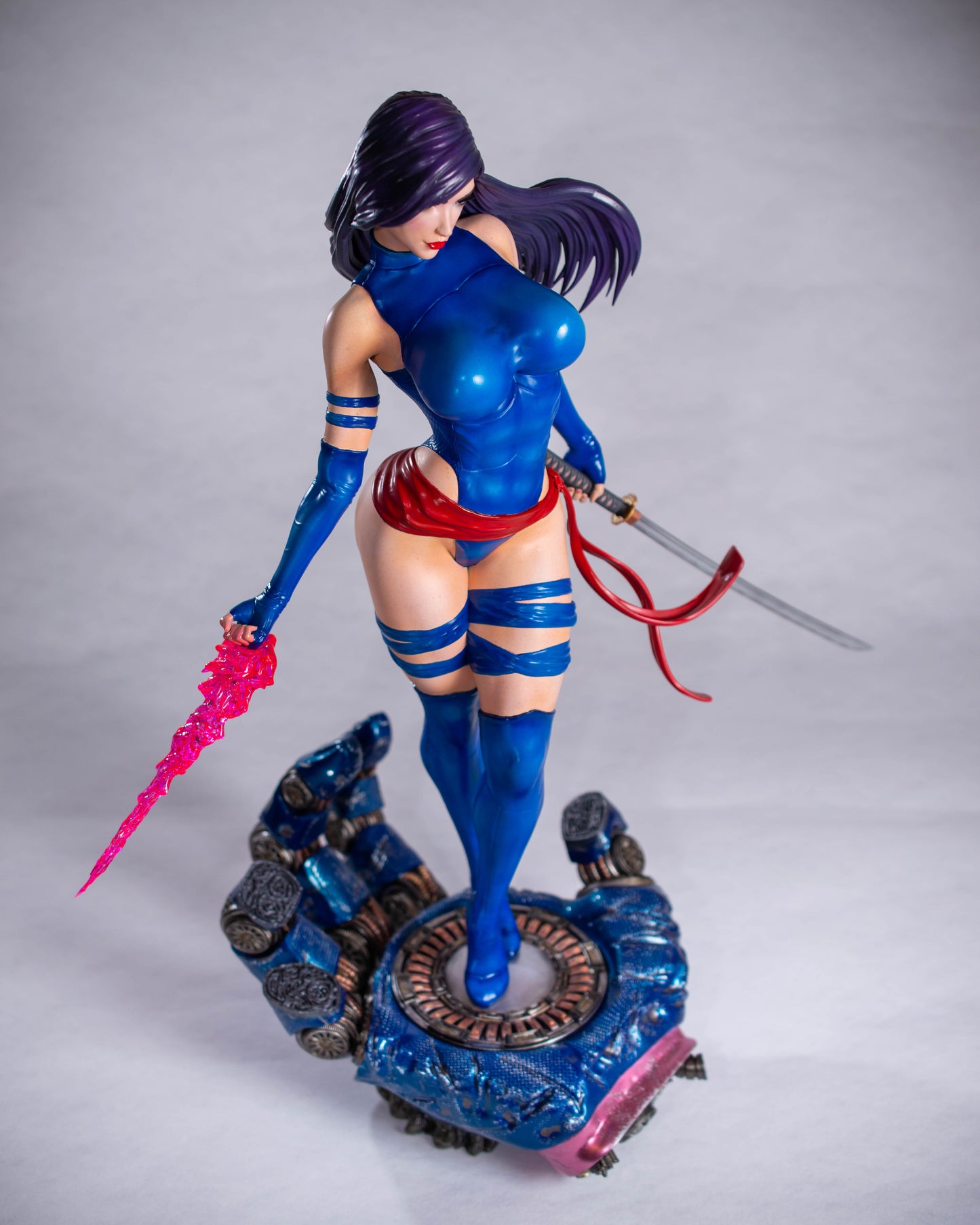 X-Men Psylocke in her classic outfit with a katana and psychic knife