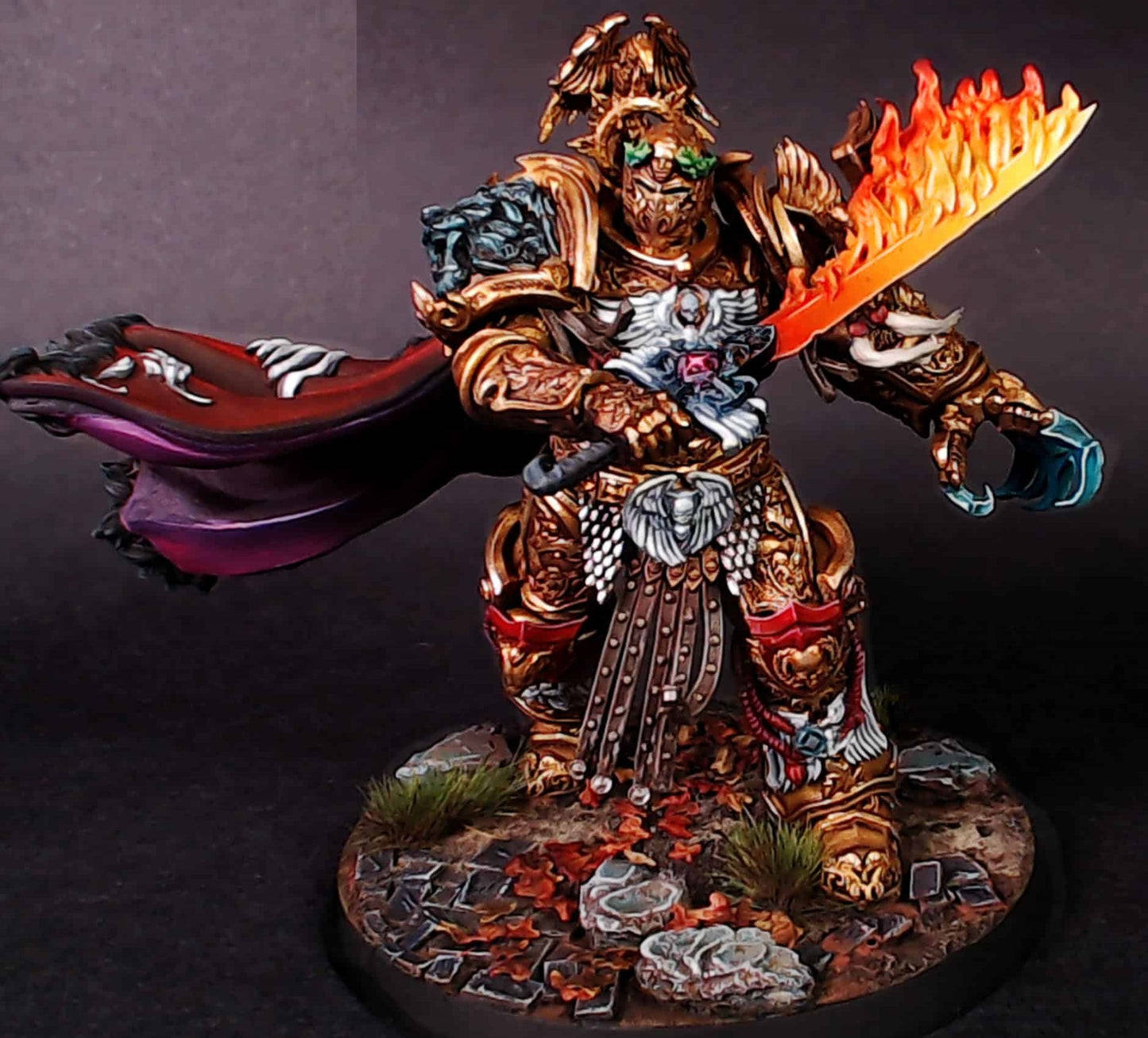 A proxy model of The God-Emperor of makind in highly detailed  baroque armour from the Warhammer 40k universe
